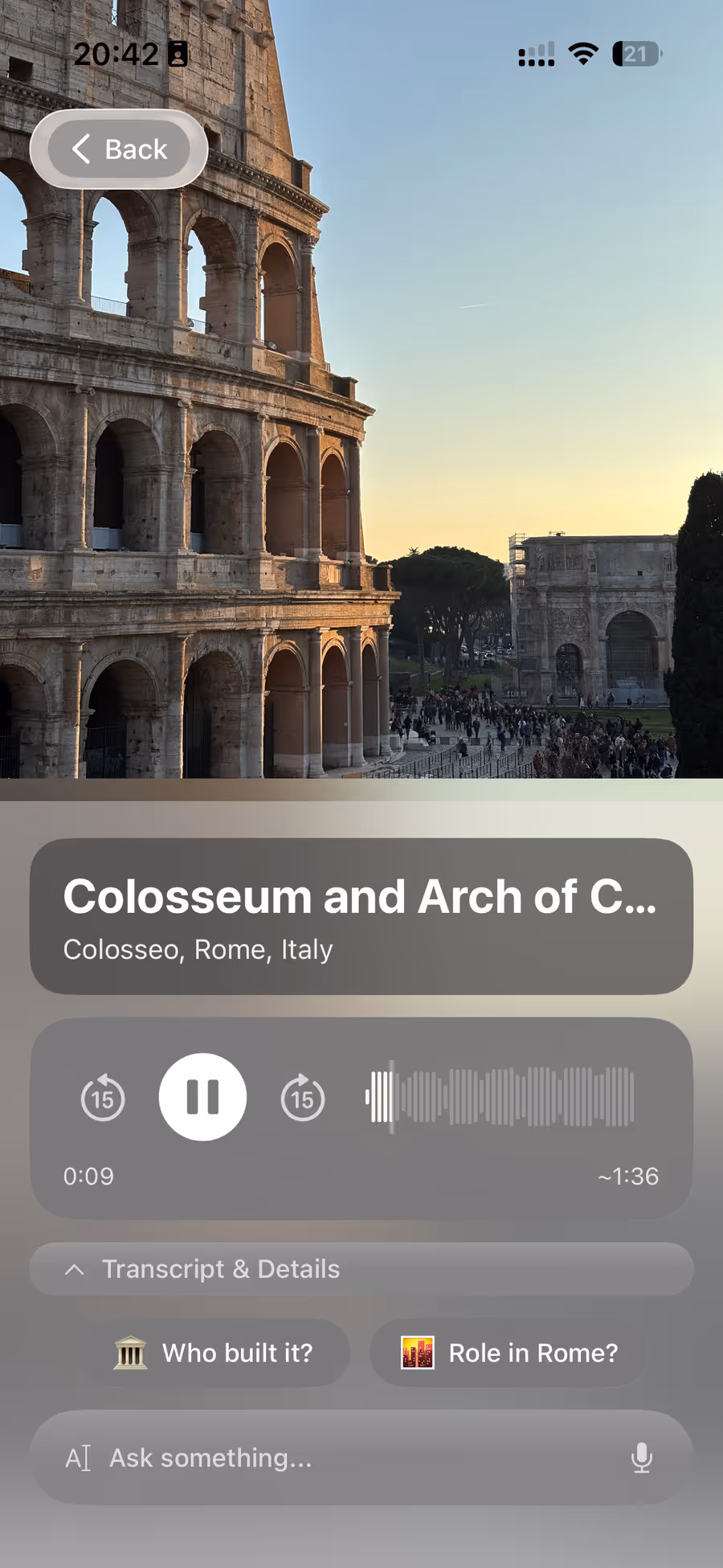 Chiaro playing an audio guide to the Colosseum and the Arch of Constantine in Rome.
